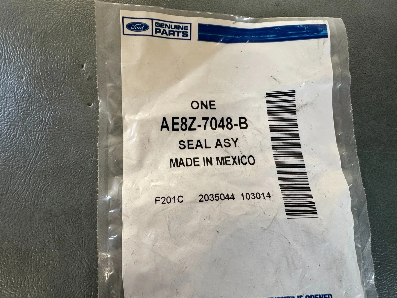 2013-2019 Ford Fiesta 1.6L EcoBoost Oil Seal Assembly AE8Z-7048-B image 2