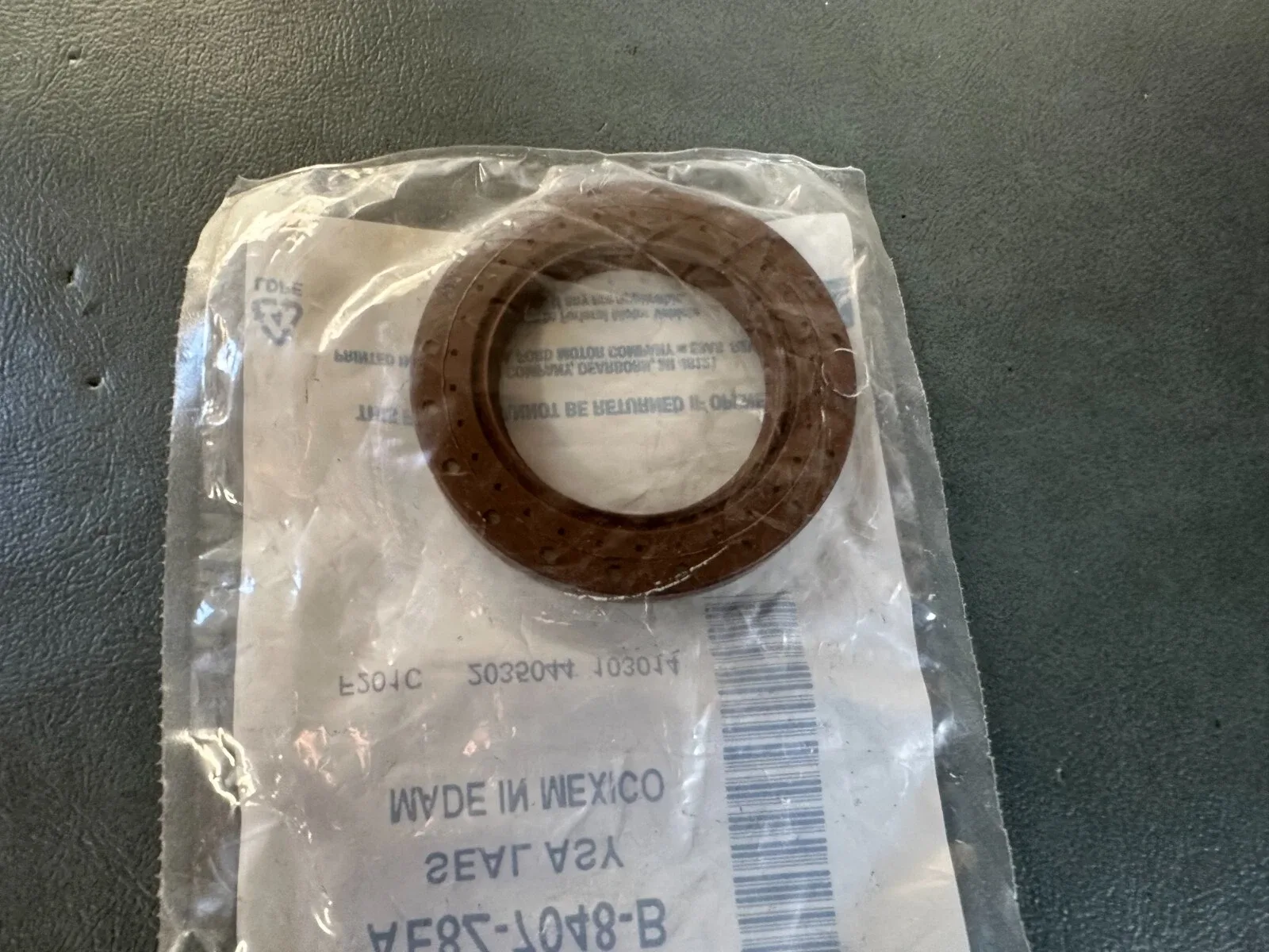 2013-2019 Ford Fiesta 1.6L EcoBoost Oil Seal Assembly AE8Z-7048-B image 3