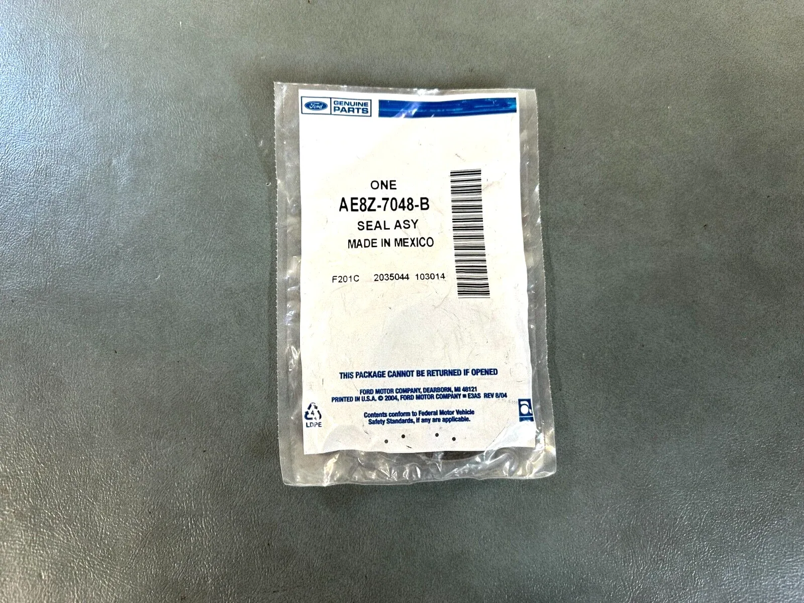 2013-2019 Ford Fiesta 1.6L EcoBoost Oil Seal Assembly AE8Z-7048-B