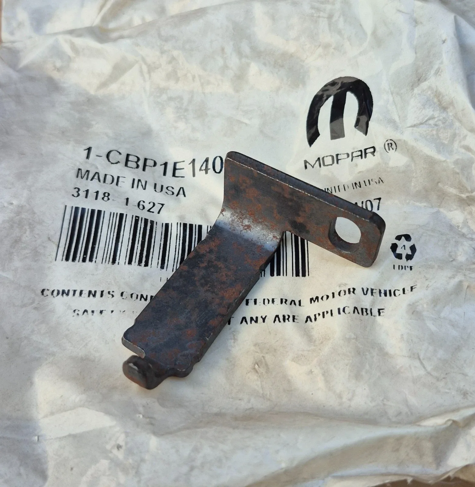 2005 2006 Chrysler Dodge Jeep NOS MoPar 42RLE Parking Pawl SHAFT PLUG BRACKET