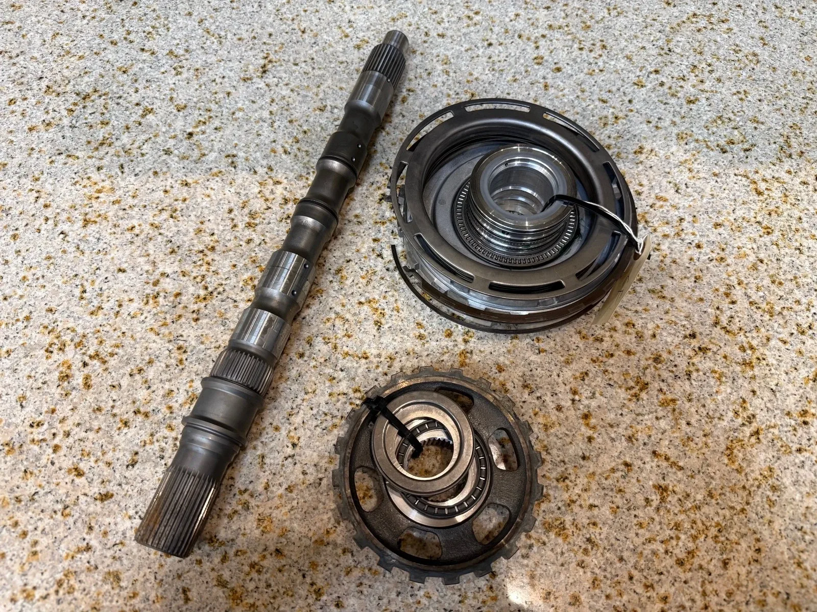 Nissan RE5R05A Output Shaft, Park Wheel & Center Support (63678A, 63690, 63632A)