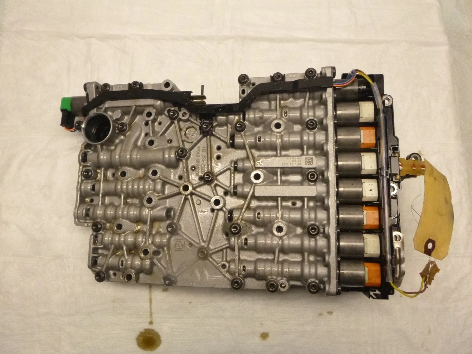 2015 BMW X1 2.0L AWD Transmission Valve Body MPN 1087227028DE