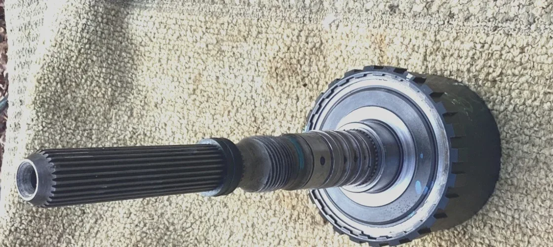 1980s Ford AOD Output Drum & Shaft      OEM Used     Approx 16 1/2”