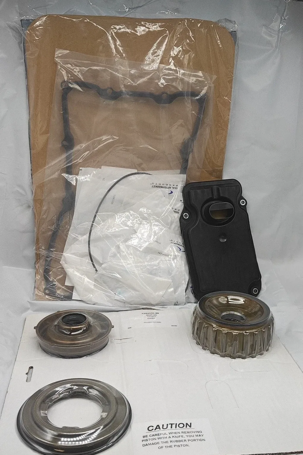 Toyota AB60E Transmission Overhaul Kit Gasket Set & Pistons — 157010, 157300
